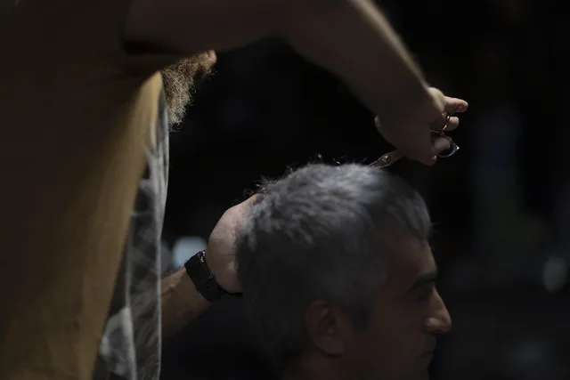 barber, haircut, barber shop, men, hair, scissors, grooming, hair stylist, hairdresser, hair salon, work, job, occupation, life, people, cosmetology, mashhad, iran. Finishing a layered haircut without flattening its shape
